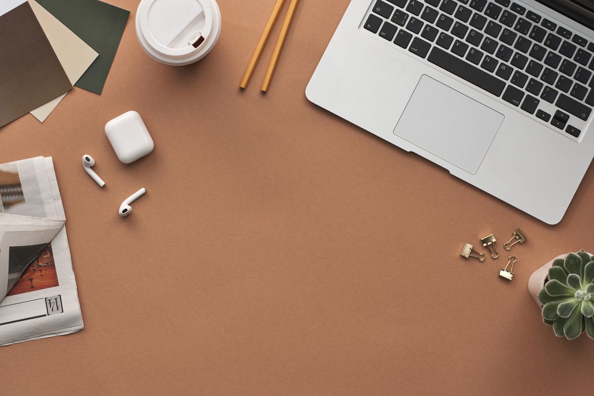 Laptop and coffee on a desk