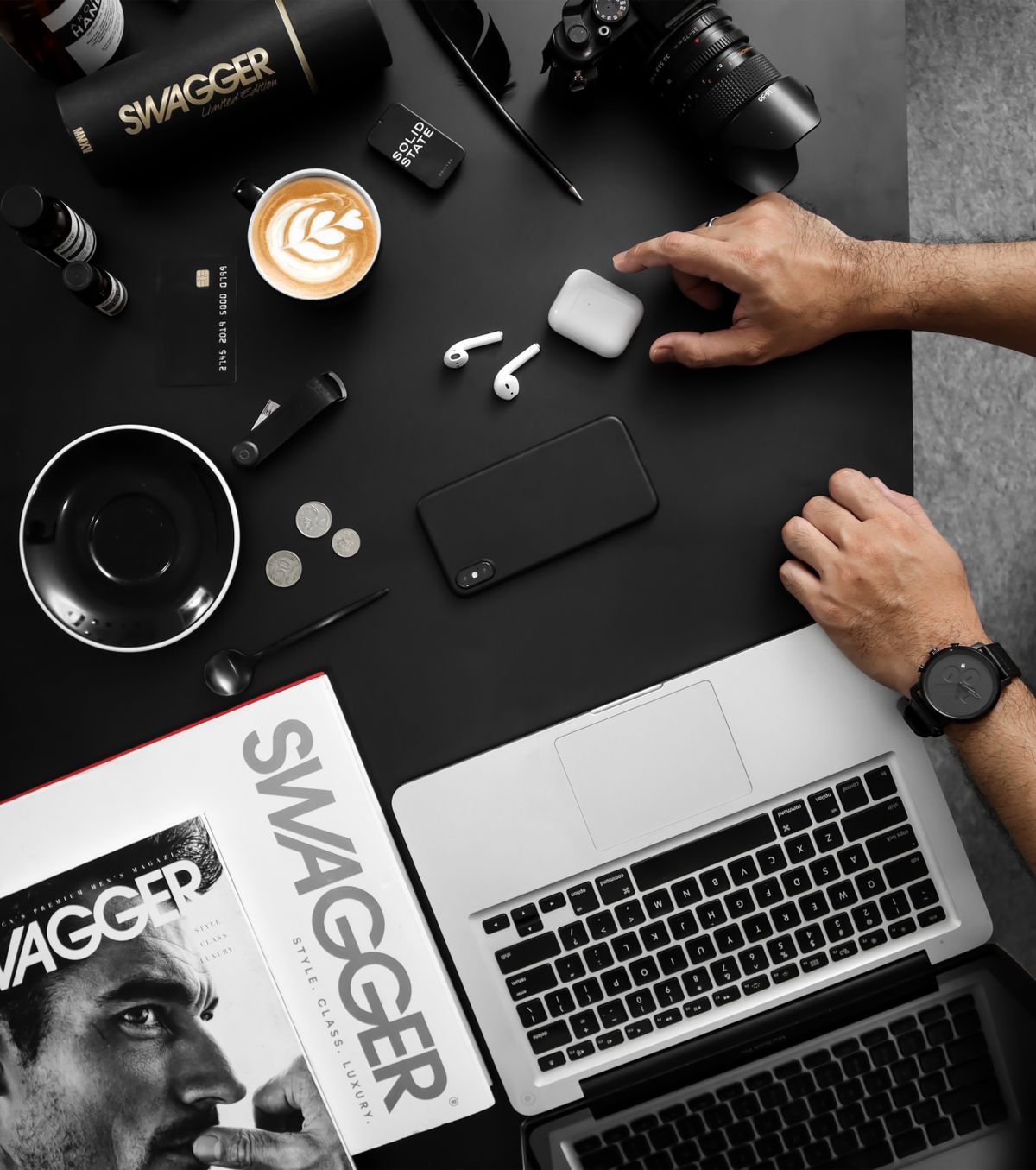 Top view of assorted tech gadgets on a desk